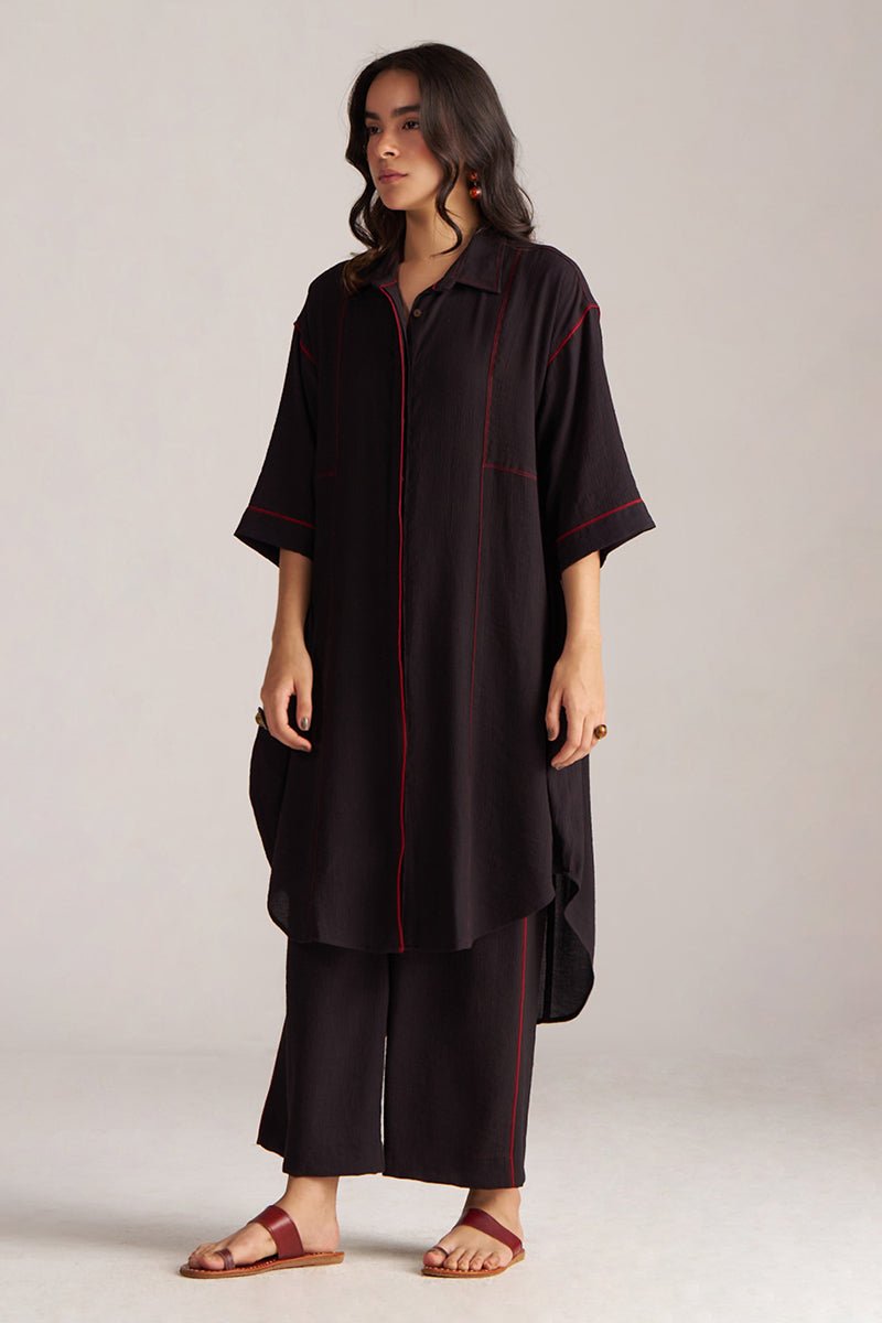 Woman wearing a black outfit with red accents on a plain background, Black Co-ord Set for Women | Rangmanch Collection | Ganga Fashions