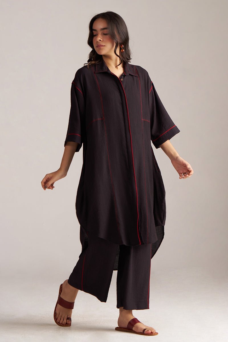 Woman wearing a black outfit with red accents on a plain background, Black Co-ord Set for Women | Rangmanch Collection | Ganga Fashions