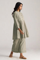 Woman wearing a light green traditional outfit with a plain background | Buy Grey Co-ord Set for Women | Rangmanch Collection - Ganga Fashions