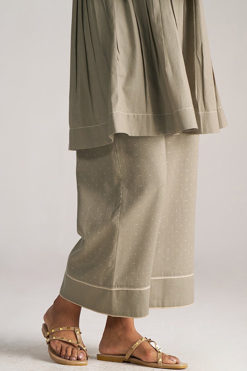 Light brown pants worn by a person on a plain background | Buy Grey Co-ord Set for Women | Rangmanch Collection - Ganga Fashions