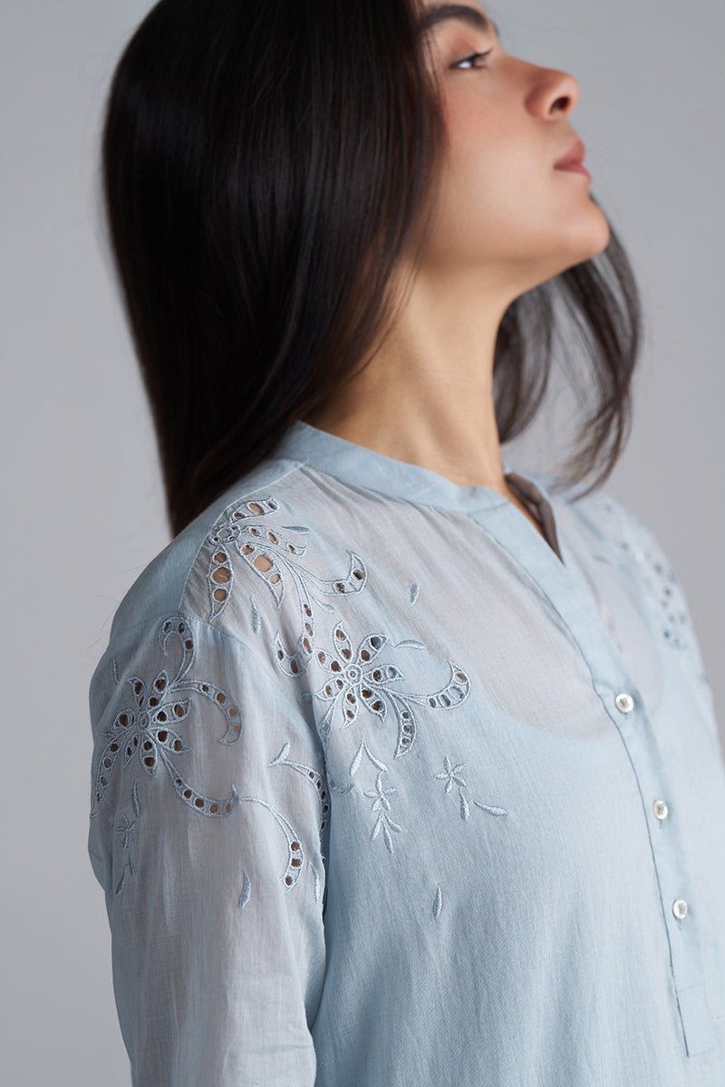Light blue embroidered blouse worn by a person on a plain background | Chalk Blue Mul Mul Co-ord Set for Women | Ganga Fashions