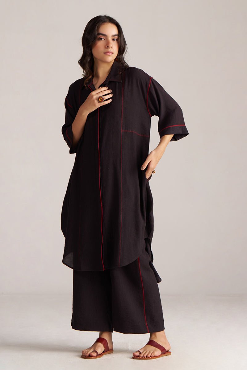 Woman wearing a black outfit with red accents on a plain background, Black Co-ord Set for Women | Rangmanch Collection | Ganga Fashions