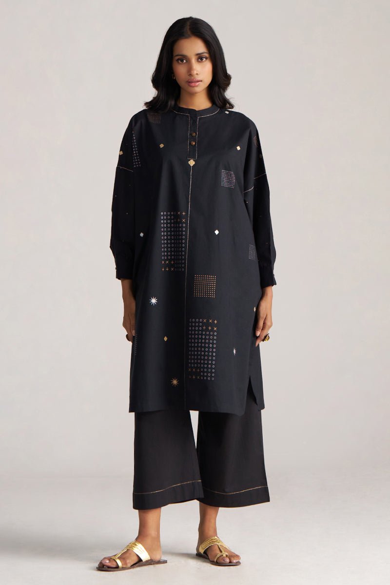 Woman wearing a black outfit with geometric patterns on a light gray background, Black Cotton Co-ord Set for Women | Rangmanch | Ganga Fashions