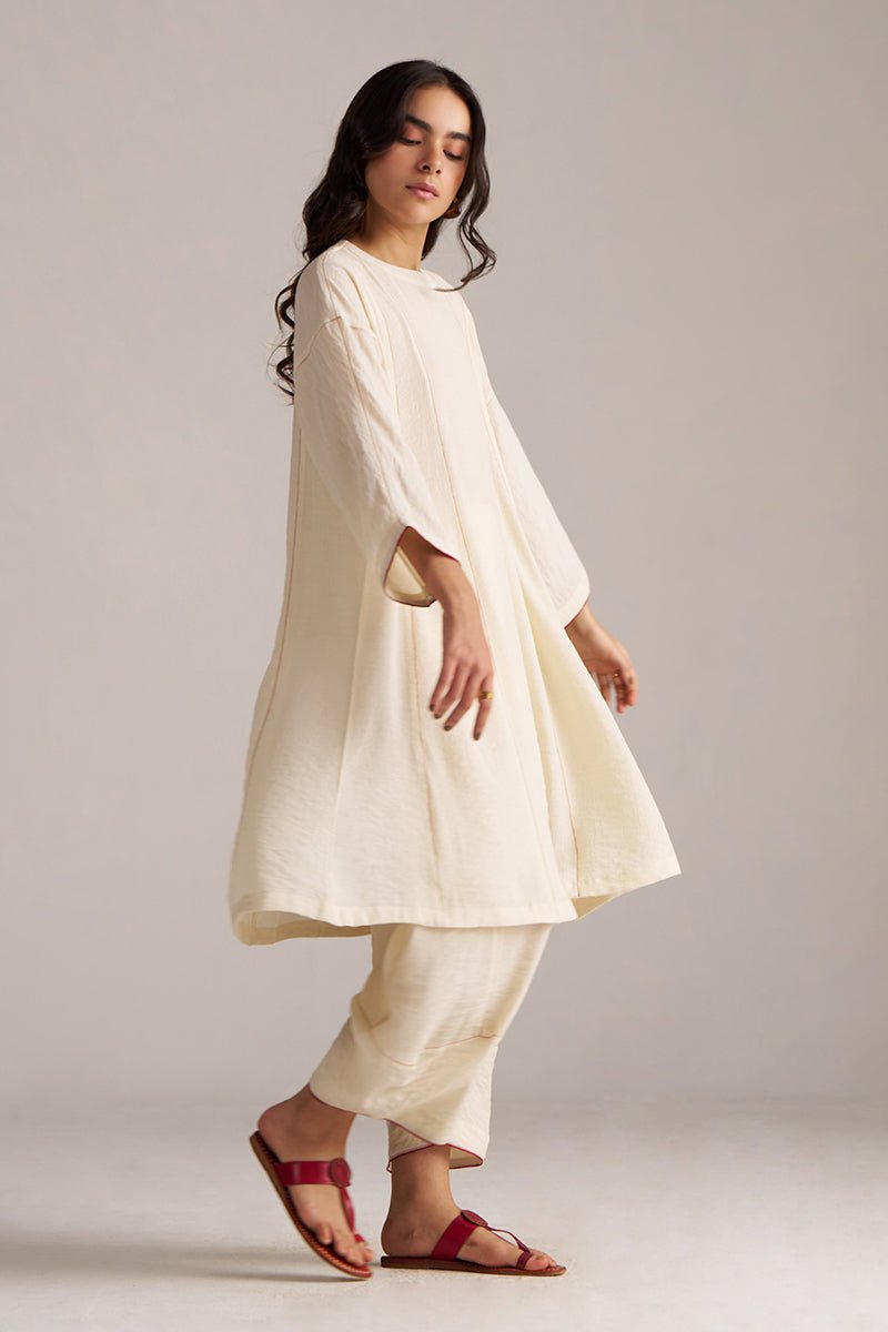 Woman wearing a white outfit with red sandals on a plain background, Birch Cream Co-ord Set for Women | Rangmanch | Ganga Fashions