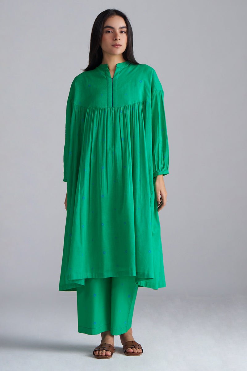 Woman wearing a green dress against a gray background, Holly Green Mul Mul Co-ord Set for Women | Ganga Fashions