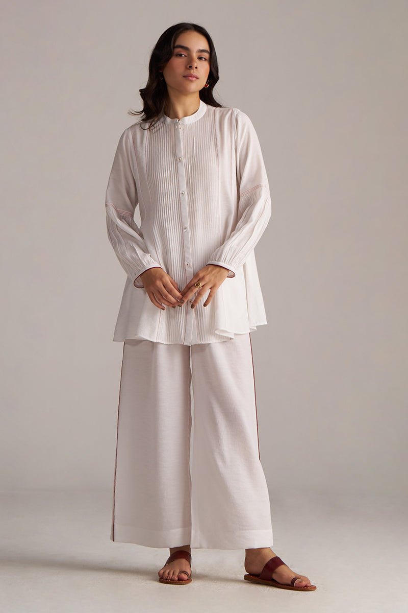 Woman wearing a white outfit with wide-leg pants against a plain background, Pure White Co-ord Set for Women | Rangmanch | Ganga Fashions