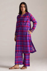 Woman wearing a purple and pink checkered outfit on a plain background, Purple Checkard Mul Mul Co Ord Set